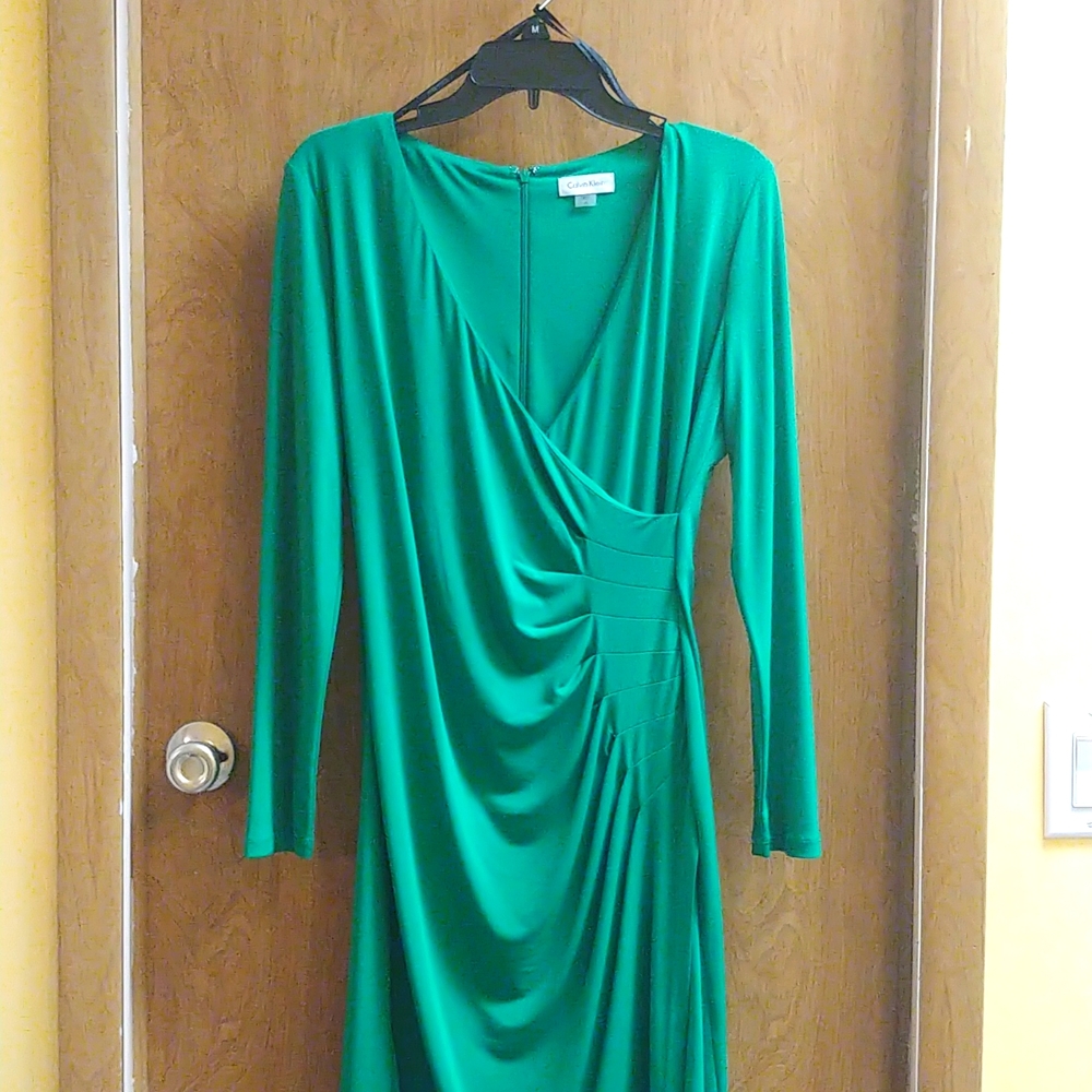 Calvin Klein long sleeved, size 10, green dress with ruching.